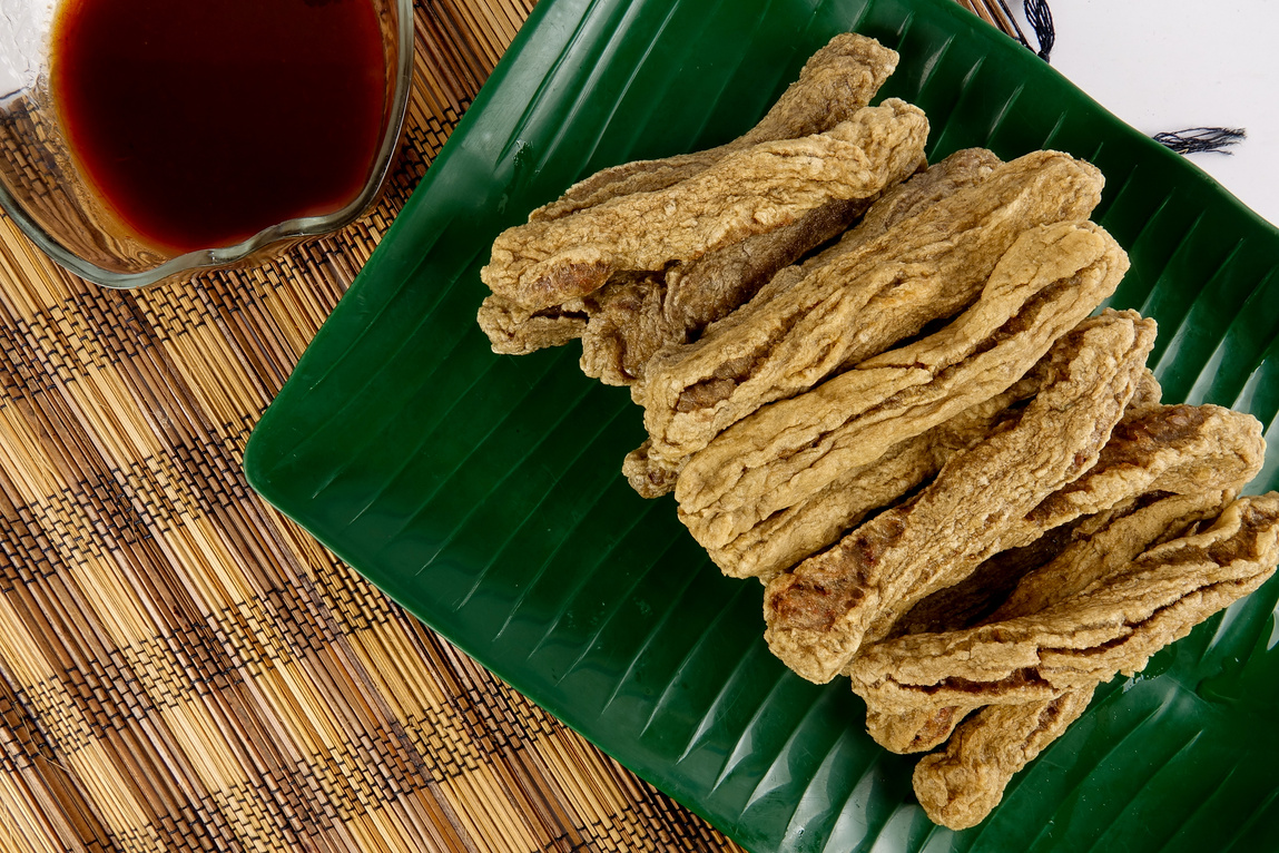 Malaysian fried fish snacks called Keropok Lekor.